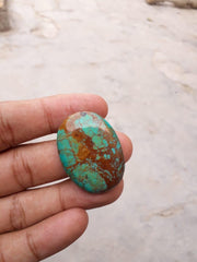 Натуральная бирюза 50,5 карата, зеленая матричная бирюза. Размеры — 35,8x26 мм.