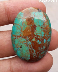 Натуральная бирюза 50,5 карата, зеленая матричная бирюза. Размеры — 35,8x26 мм.